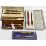 A red and gold plated Parker ballpoint pen and matching Parker No.