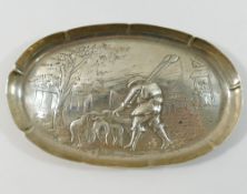 A Victorian oval silver tray embossed with a shepherd and sheep,