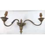 Three two-light brass wall lights,