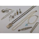 A quantity of silver and costume jewellery including a cultured pearl necklace and bracelet,