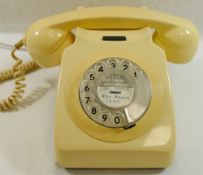 A cream coloured rotary dial GPO 746 telephone CONDITION REPORT: Please note -