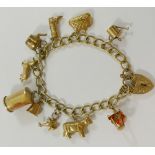 A 9 carat gold curb link charm bracelet, London 1973, with ten charms including a cow,