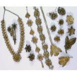 A filigree flowerhead brooch stamped '800', and other assorted filigree items including a necklace,