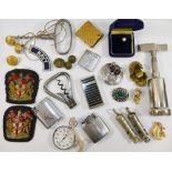 A collection of miscellaneous items comprised of corkscrews, lighters, brass buttons,