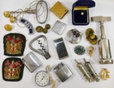 A collection of miscellaneous items comprised of corkscrews, lighters, brass buttons,