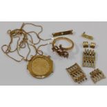 A quantity of broken yellow metal jewellery items, combined weight 11.