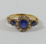 A late Victorian/Edwardian sapphire and diamond cluster ring,