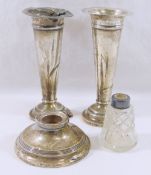 A pair of small silver trumpet-shaped vases with loaded bases, 13.