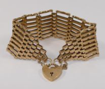 A large 9 carat gold gate link bracelet, with heart-shaped padlock clasp, London 1976, 2.