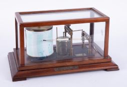 A Negretti & Zambra mahogany cased barograph, number 43414, with personalised plaque dated 1973,