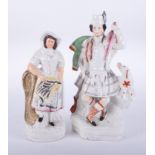 Two Victorian Staffordshire figures including Highland figure, 40cm.