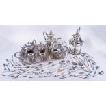 A silver plated tea service with tray including a spirit kettle together with fancy tea spoons,