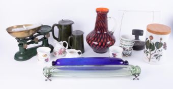 A mixed collection including kitchen scales, art glass vase, Victorian rolling pins, and reading
