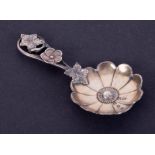 A Victorian silver caddy spoon, by Hilliard and Thomason, Birmingham 1872, lobed circular bowl, wire