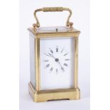 A French brass cased carriage clock, platform escapement, the white dial with Arabic and roman