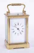 A French brass cased carriage clock, platform escapement, the white dial with Arabic and roman