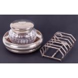 A 20th Century silver six division toast rack, a modern silver wine bottle coaster and a silver &