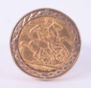 A 9ct yellow gold ring (not hallmarked or tested) set with a 1925 full sovereign