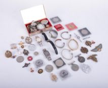 A mixed lot including pocket watches, wristwatches, coins, badges etc.