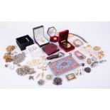 A mixed bag of costume & silver jewellery to include necklaces, earrings, brooches, a