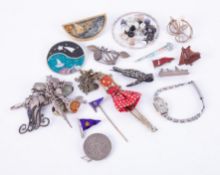 A mixed lot of brooches, including silver boat brooch (Plymouth), charm bracelet, silver omnibus