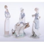 Lladro, three figurines, the tallest 27cm.
