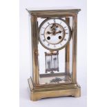 A French four glass table clock, the dial with escapement action, indistinctly marked Henri Marc,