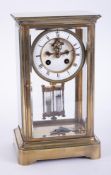 A French four glass table clock, the dial with escapement action, indistinctly marked Henri Marc,
