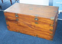 A 19th Century camphor wood campaign chest with brass mounts, corners and recessed Military handles,