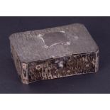 An Edwardian silver jewel box with textured silverwork, maker mark JD,WD with silk lining, hinged