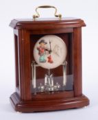 Hummel, an anniversary mantle clock in mahogany case, height 27cm.