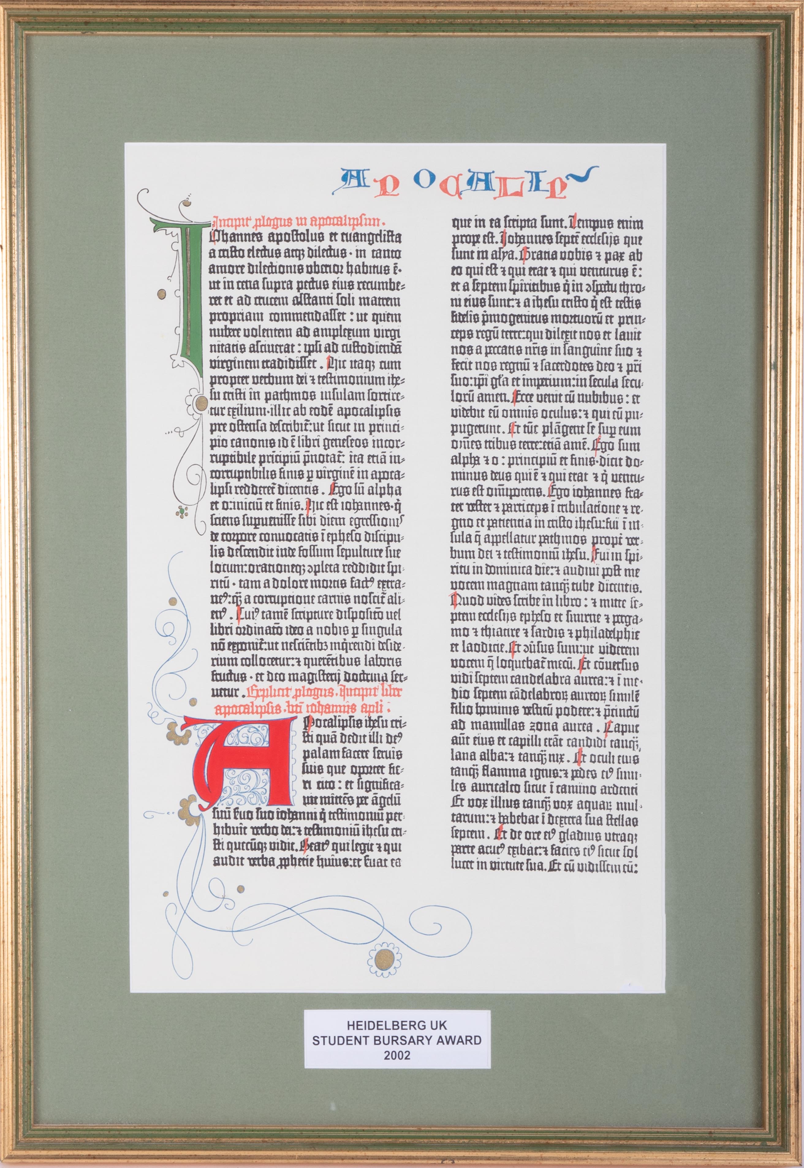 A print of Gutenberg Bible page, framed and glazed, 37cm x 24cm.