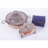 A 19th Century silver plated double ink box, one section fitted with a blue glass inkwell,