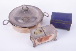 A 19th Century silver plated double ink box, one section fitted with a blue glass inkwell,