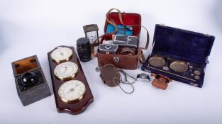 A mixed collection including three dial barometer set, cased scales and weights, Cyma carriage