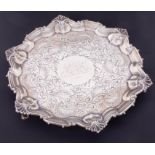 A Victorian silver waiter, with engraved decoration, central monogram with date 1897, gadrooned