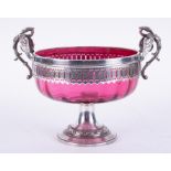 A WMF 1902 cranberry glass and silver plated fruit bowl.
