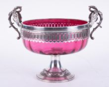 A WMF 1902 cranberry glass and silver plated fruit bowl.