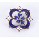 An Antique enamelled brooch/pendant in flower design, (missing pin).