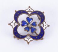 An Antique enamelled brooch/pendant in flower design, (missing pin).