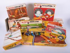 A large collection of Hot Wheels including 'Dual Lane Speedometer', 'Sizzlers Stunt Loop'