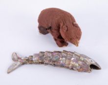 A bottle opener in the form of a mother of pearl articulated fish, length 19cm, together with a Alps