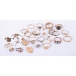 A mixed bag of 9ct yellow gold jewellery to include eleven rings, four pairs of hoop earrings