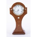 An Art Nouveau mahogany and mother of pearl inlaid mantle 'waisted' clock, French movement, with