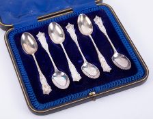 A set of six silver George V fancy teaspoons in fitted velvet case, marked John Vincent, 87.6g.