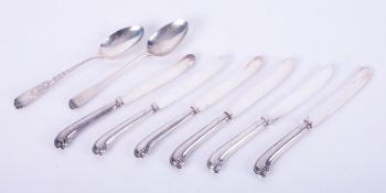A collection of silverware to include six butter knives, 127.0gm, a silver spoon with