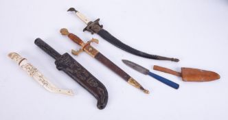 Five various knives including replica middle Eastern dagger, carved bone? hunting knife.