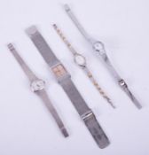 An Incabloc ladies silver Carronade wristwatch together with three other ladies wristwatches