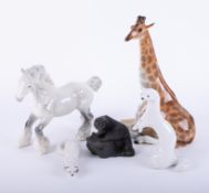 Three Russian pottery animals including giraffe, Beswick cantering shire horse and a resin sculpture