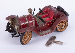 Shuco Mercer, number 1225 tinplate car with key.